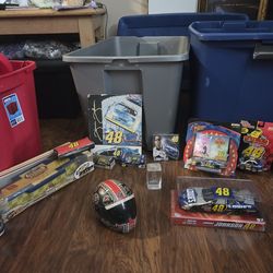 Jimmy Johnson Nascar's collection set  5 medium size car's one  plaque ceramic tin box that has 3 in it helmet big die-cast car comes in a box cyrstal