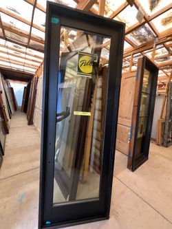 Black and black glass Pella door 34x94