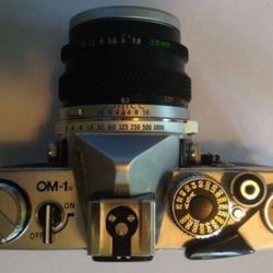 Camera Olympus OM-1n with 2 wide and zoom lens