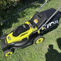 NEW OPEN BOX RYOBI 16 INCHES 18 V BRUSHLESS PUSH LAWNMOWER IS AN ORIGINALBOX INCLUDES TWO 2Am LITHIUM BATTERIES WITH FAST  CHARGER GRASS CATCHER. IT'S