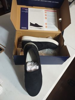 Womans steel toe slip on. Rockport size 6