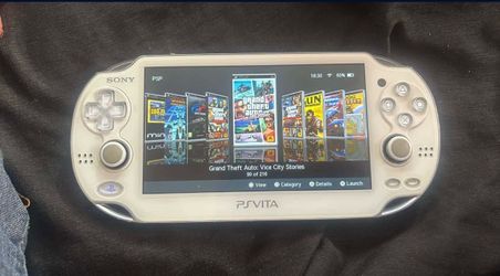 White ps vita with games
