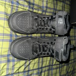 all-black Nike Court Borough Mid 2 sneakers.