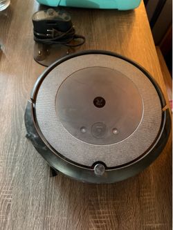 iRobot Roomba robot vacuum with charging base