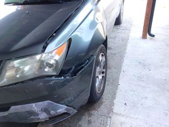 Dark gray MDX  with Front End Damage