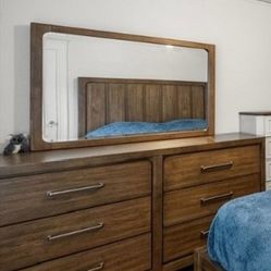 Cabalynn King Panel Bed with Storage with Mirrored Dresser