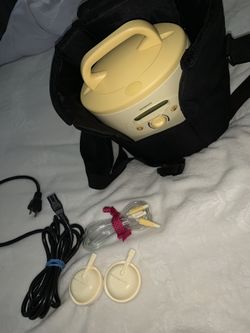 Selling my pump, new born baby clothes, nursing blanket, diaper sacks and breast milk bags