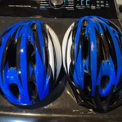 Two Small Bike Helmets