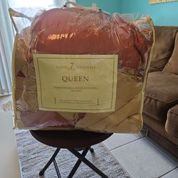 Comforter queen size bed skirt,shams  and decorative pillows.