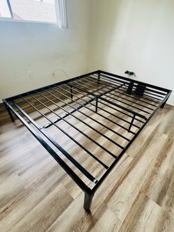 Move out sale: metal bed frame- queen size
