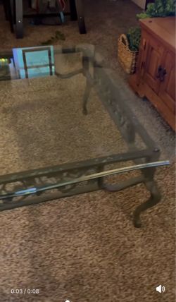 Wrought iron glass top table