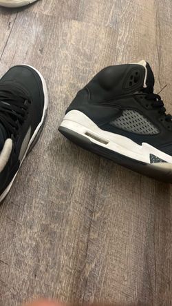 Black and white Jordan 5s