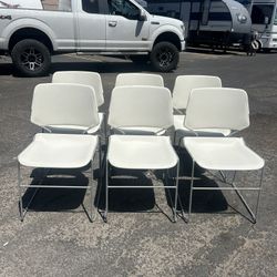 6 White Stackable Office/Lobby Chairs- $15 Each