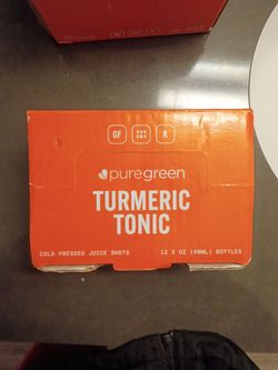 Pure green turmeric tonic cold-pressed juice shot s