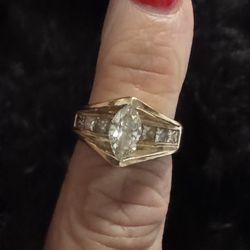 Vintage Ladies KOBI 14k yellow gold diamond engagement ring with a marquise shaped diamond   