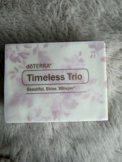 The doTERRA Timeless Trio (containing Beautiful Touch, Shine Touch, and Whisper Touch)
