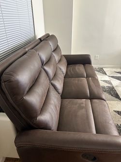 Brown Leather Reclining Sofa
