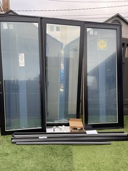New Patio Door Pella Lifestyle Black Outside Aluminum.  Wood Interior White Size W 105.  H 93.  Scren Lock Included. $2650 