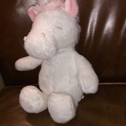 Carter’s wind up, unicorn plush