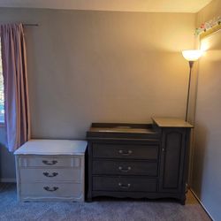 Gray Changing Table and White Dresser