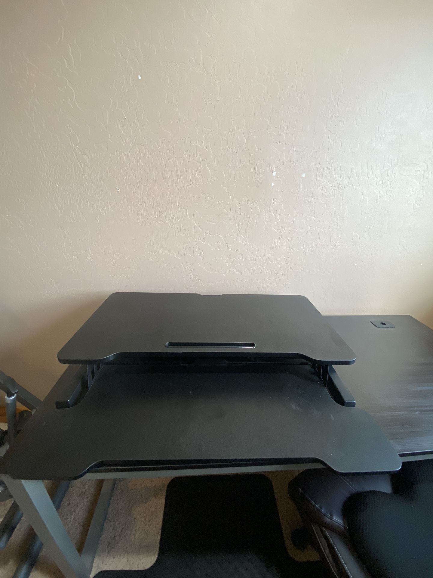 Desk converts to standing position
