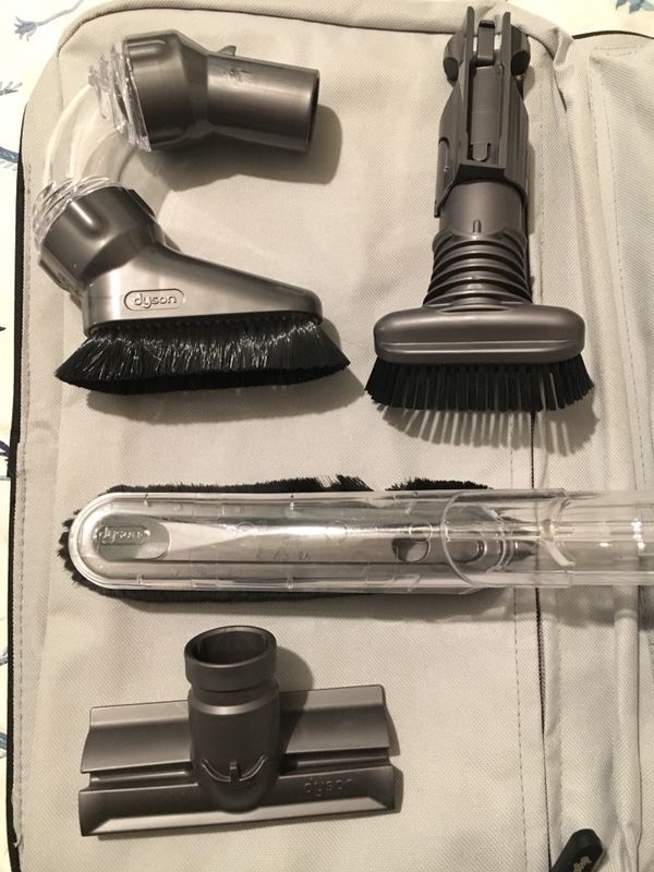 Dyson bag & some of Dyson home cleaning kit