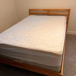 Sturdy wooden bed frame with comfortable mattress included