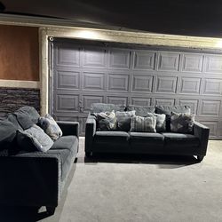Beautiful two piece grey sofa set in great condition super comfy and nice asking 580