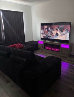 Large Black Sectional Sofa with Ottoman