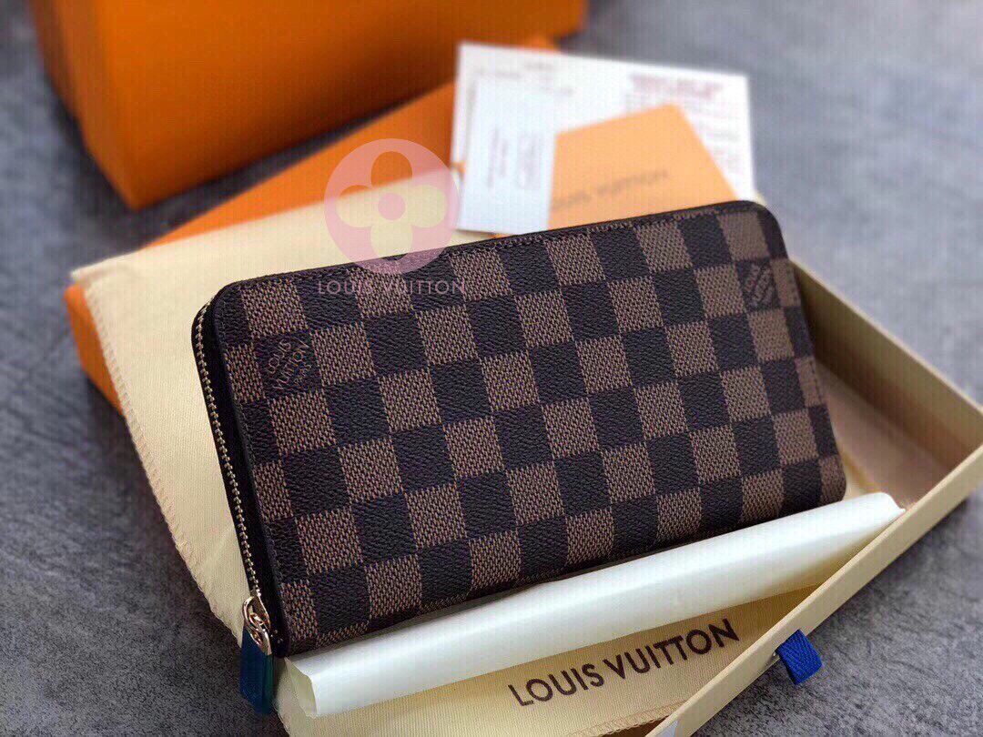 Leather wallet Louis Vuitton Brown in Leather - 24969731