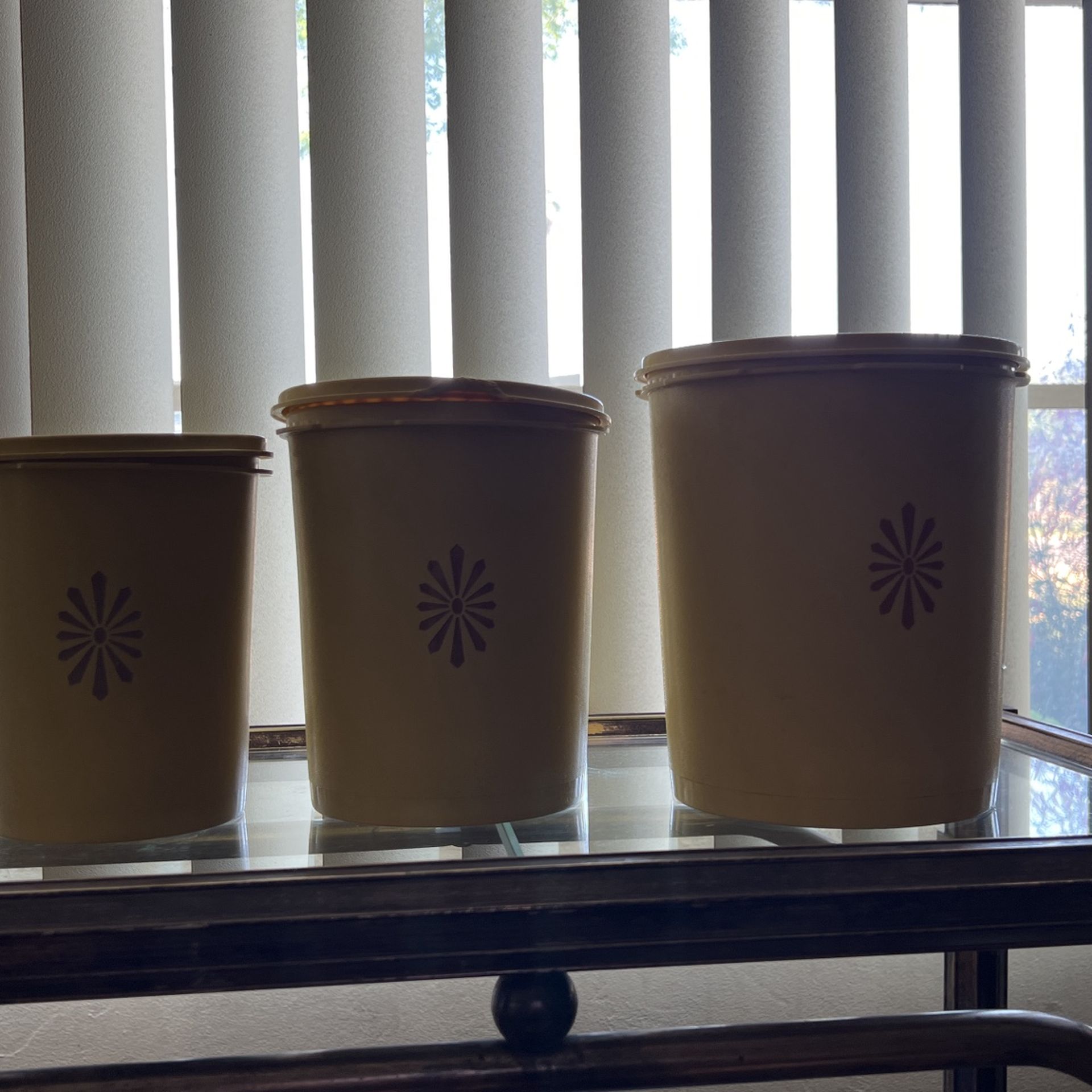 Three Yellow Tupperware Containers