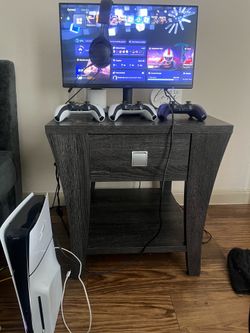 Ps5 with 3 controllers and a monitor