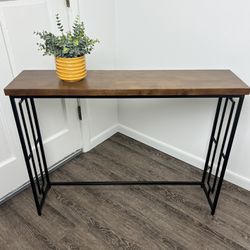 41” Narrow Console Table with wood top black metal base. 