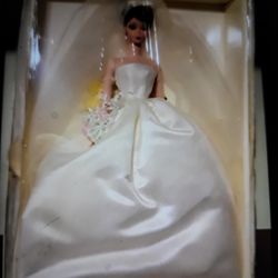 Barbie doll silk tone bride.\nOne eighty five
