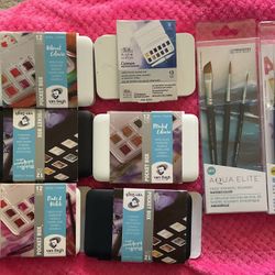 Watercolors And Pain Brushes 