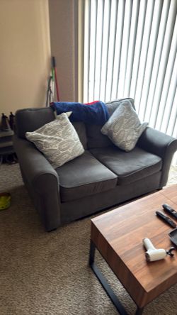 Couch and entertainment center.