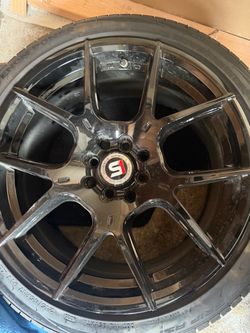 Barely used black set of spec-1 SP-71 gloss black 4x100 4x114 hub bore venom covert grip 215/45r17 tires