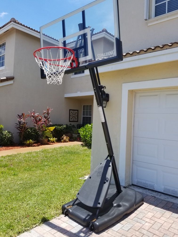 Spalding NBA 54" Portable Angled basketball Hoop with Polycarbonate Backboard