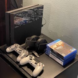 PS4 + Games And Accessories 