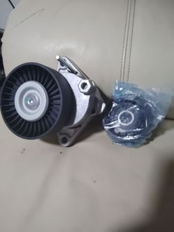 Serpentine Belt Tensioner with Idler Pulley