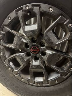 2 Nitto Terra Grappler G2 Tires 265/70R17 – 1 on OEM Nissan Frontier PRO-4X Wheel