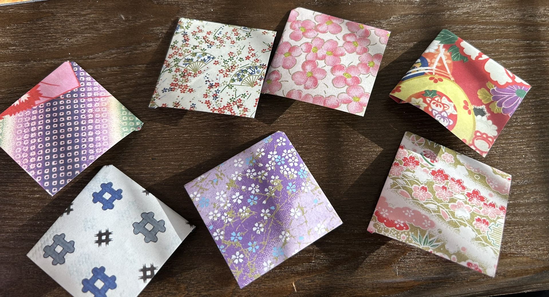 Corner book markers and other origami