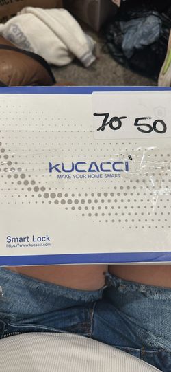 KUCACCI branded smart door lock, potentially a fingerprint-enabled model