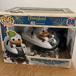 Funko Pop! Disneyland 65th anniversary Matterhorn bobsled attraction and Donald duck