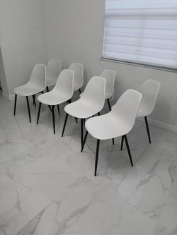 8 Dining Chairs - Price is for all of them