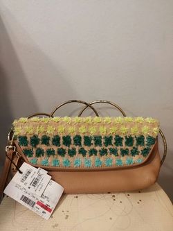 Fossil leather straw pouch clutch
