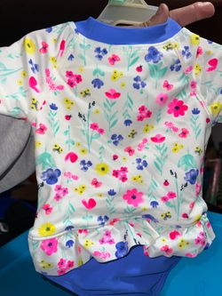 NWOT 6/9mos easy snap swimsuit
