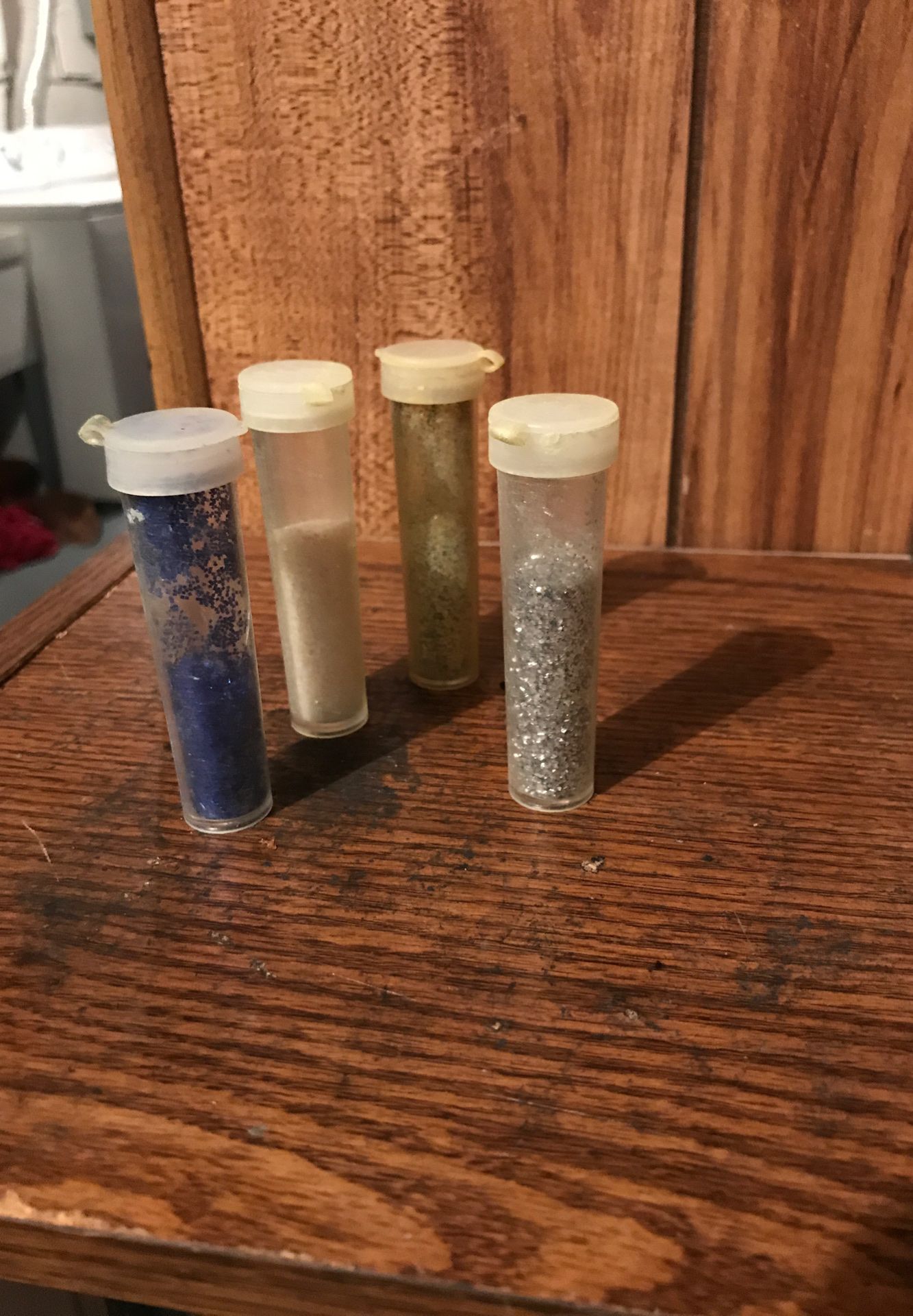 4 tubes of glitter