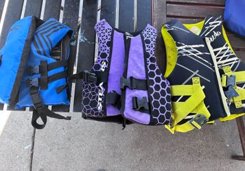 Kids water vests.