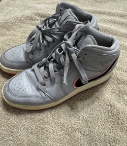 Nike Air Jordans Grey High top Sneakers